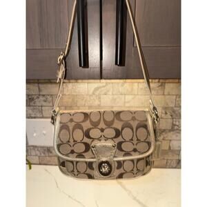 1795. Coach 2011 Penny Flap